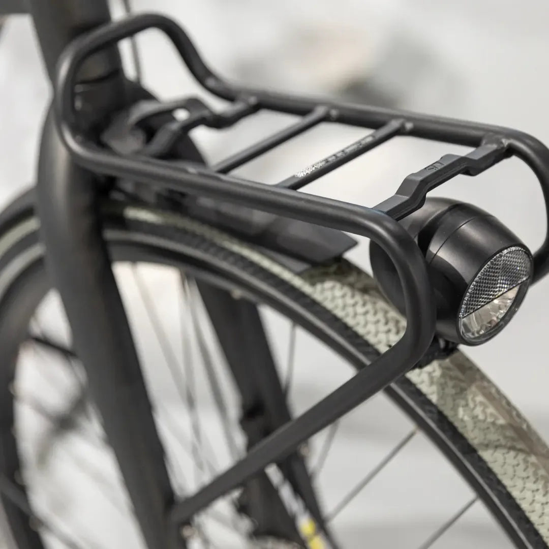 A close-up of the rear trunk and light of the Cortina Common Family electric bike