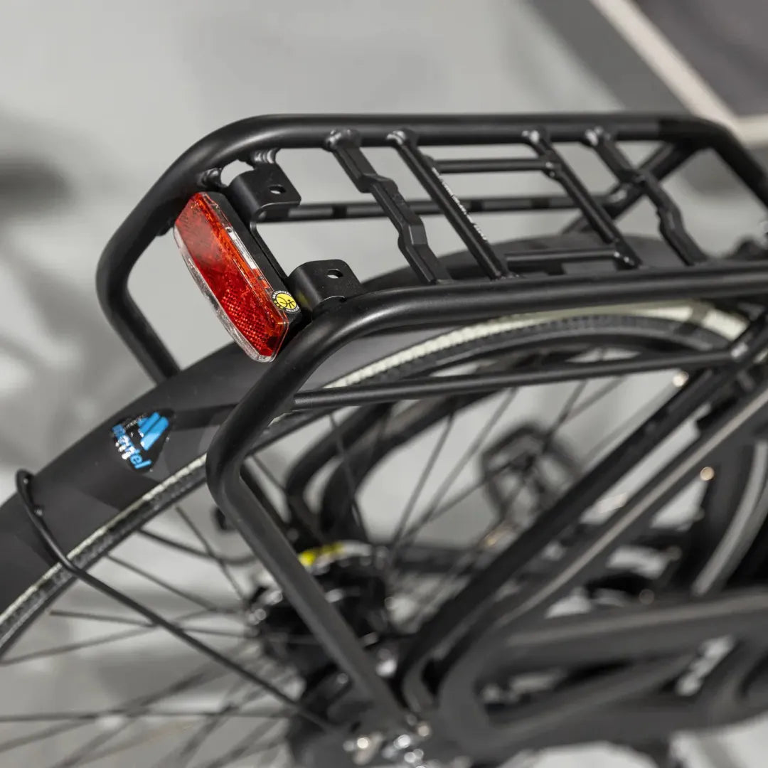 A close-up of the trunk and light on the Cortina Common Family electric bike