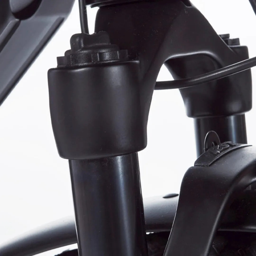 A close-up of the front fork of the Cortina E Mozzo electric bike, showing its shape