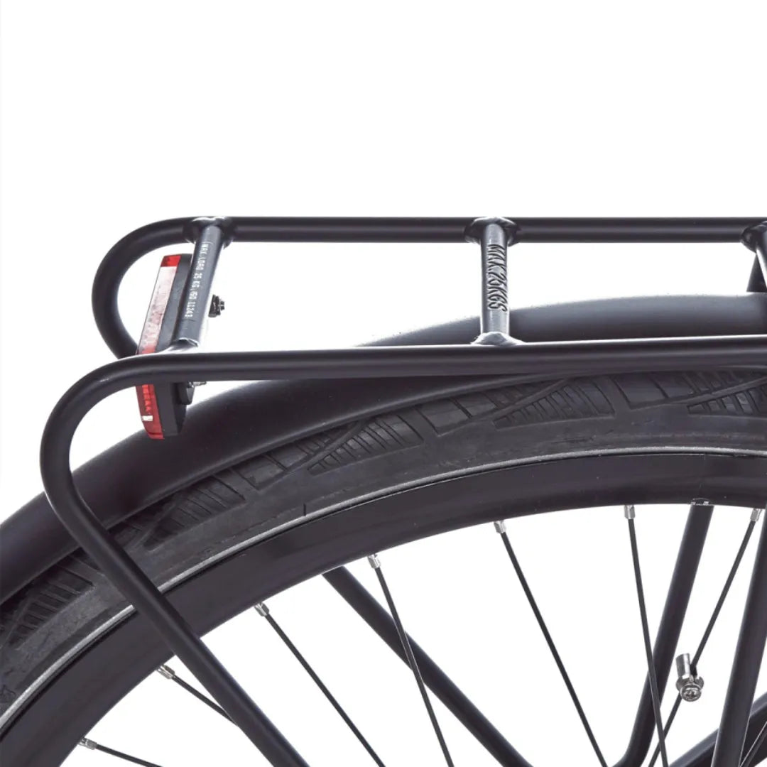 Close-up of the rear wheel and trunk of the Cortina E Mozzo electric bike