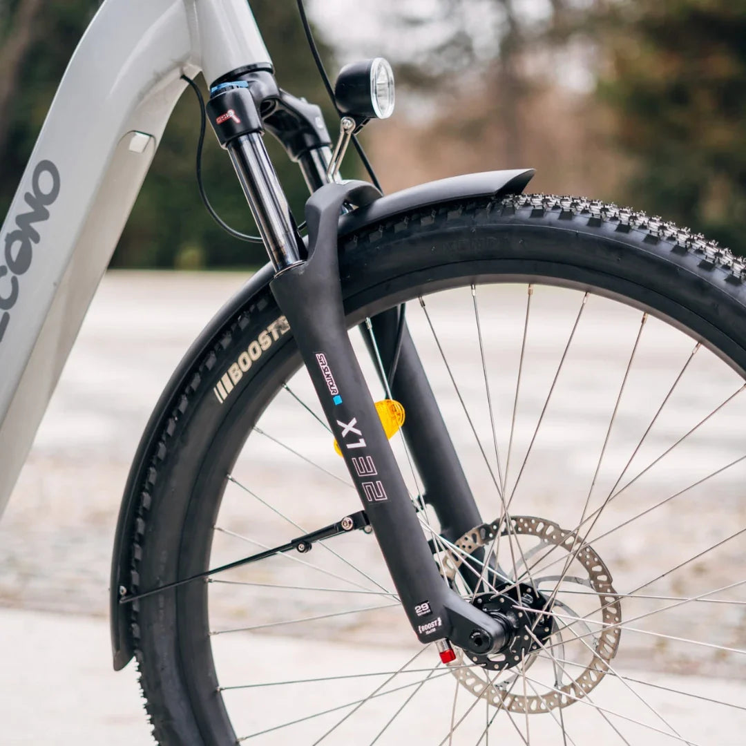Electric Bike Econo Gams Suv Eec6, features a front suspension fork, durable tire, integrated light.