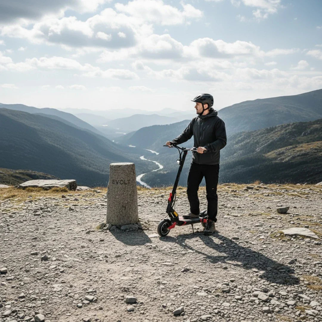 Electric scooter ECO Speed 9 – man on scooter, mountain landscape background
