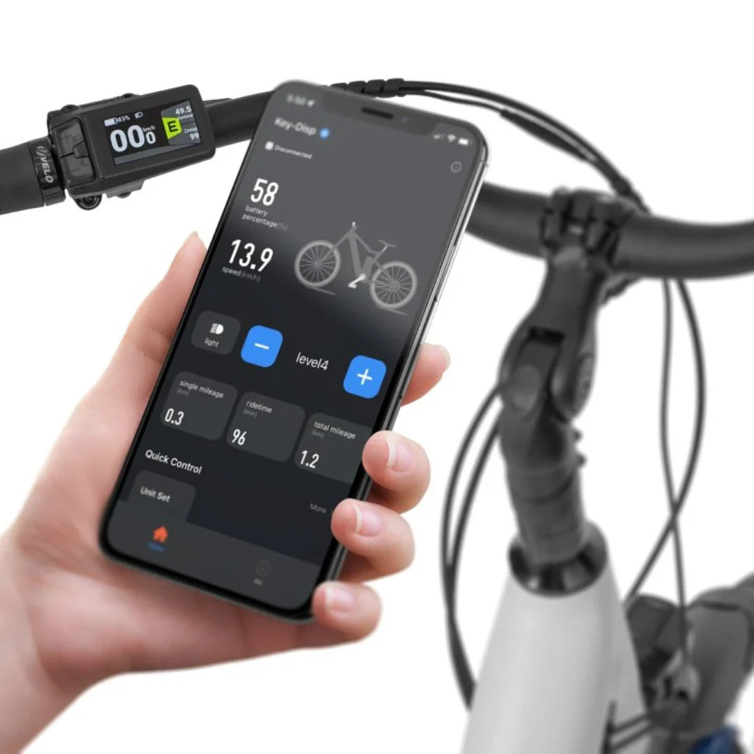 Electric Bike Ecobike Lx 100, smartphone displaying riding stats, nearby bike handlebar with display.