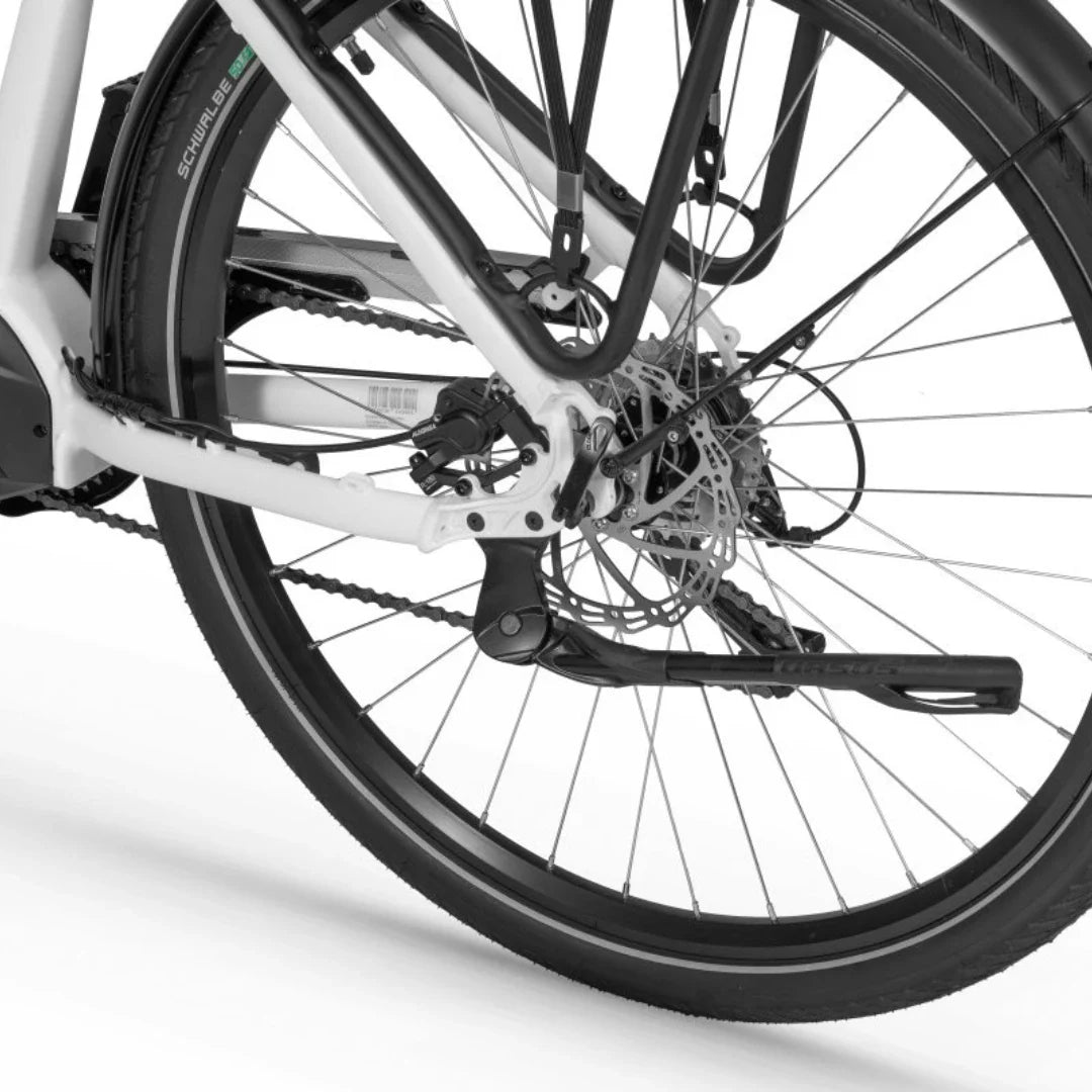 Electric Bike Ecobike Lx 100, detailed view of rear wheel and disc brake system, durable components showcased.