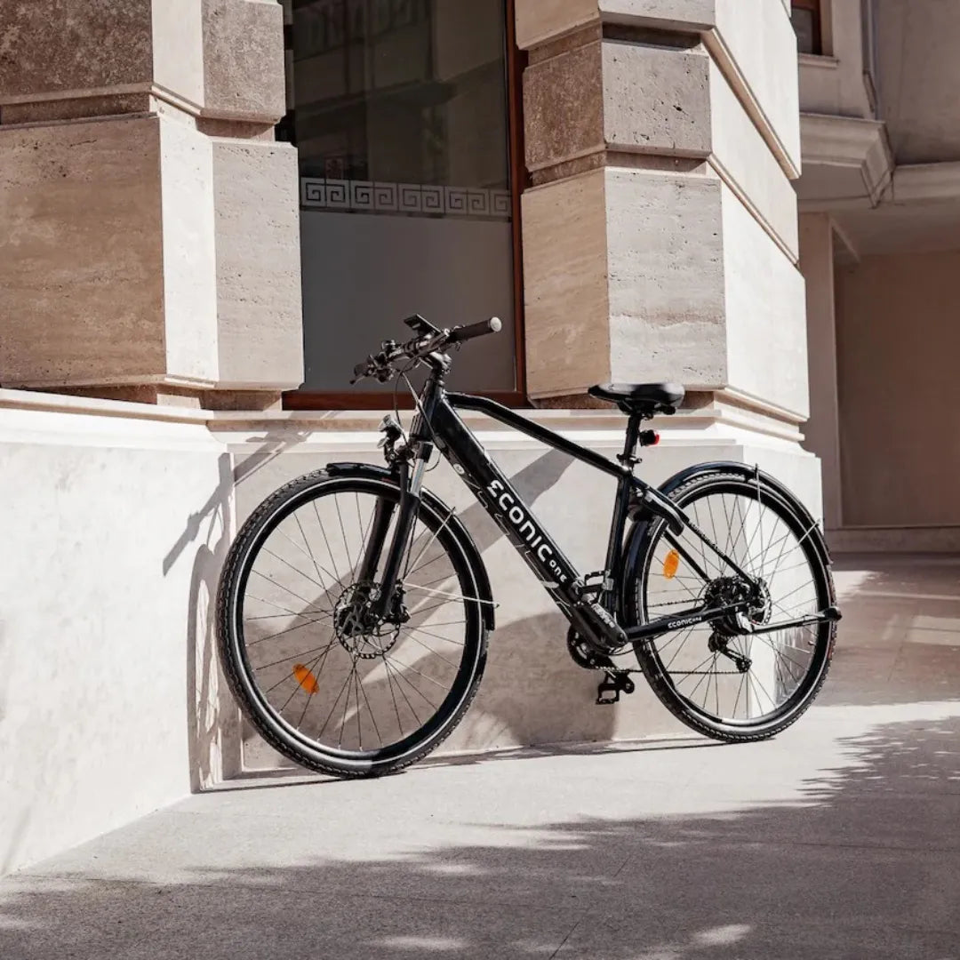 Electric Bike Econic One Smart Urban features a sleek design, black frame, and robust tires for urban commuting.