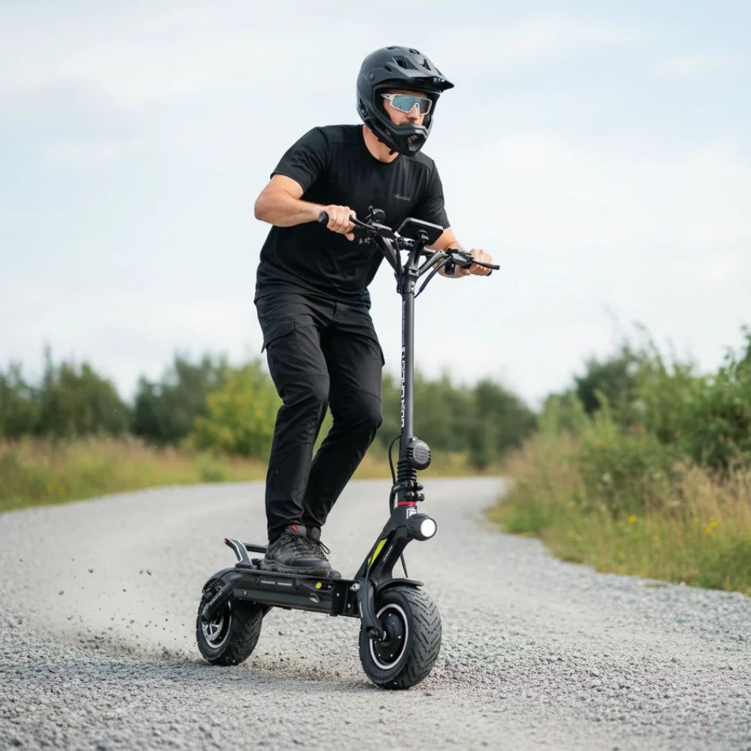 Electric scooter Dualtron NEW ACHILLEUS – rider on gravel path