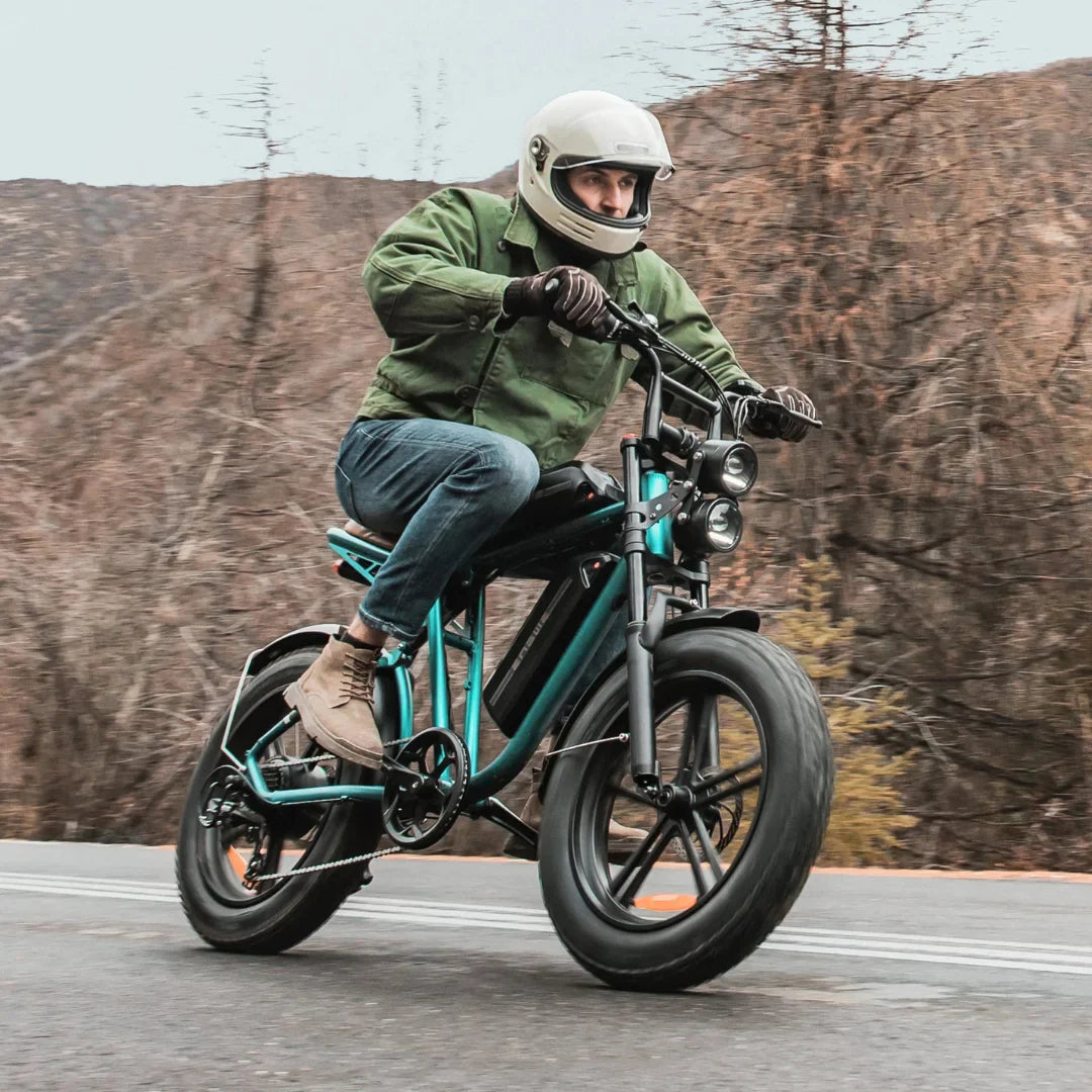 Electric Bike Engwe M20 features a sleek design, fat tires, dual front lights, and a rider in action.