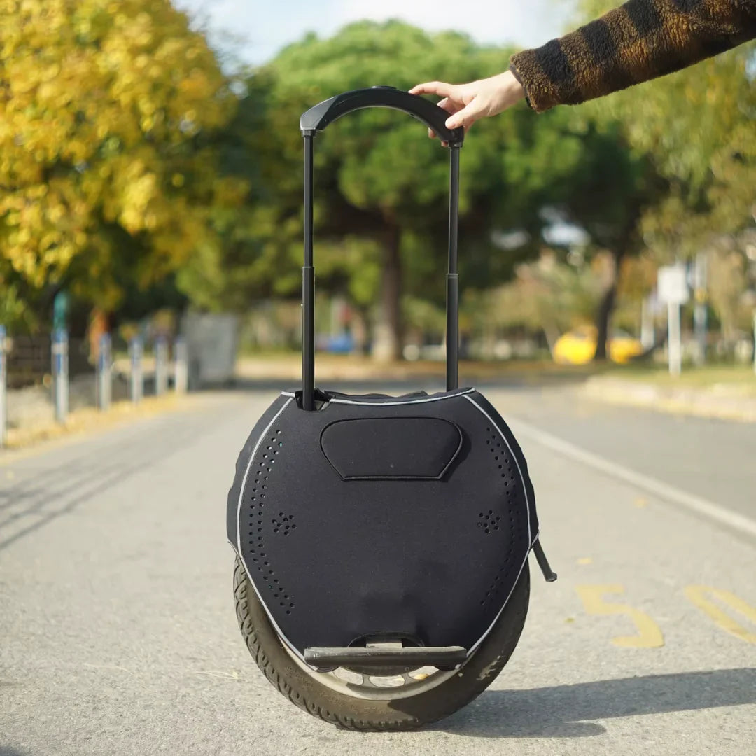 Electric Unicycle Kingsong 18L features a sleek design with a retractable handle for easy transport.