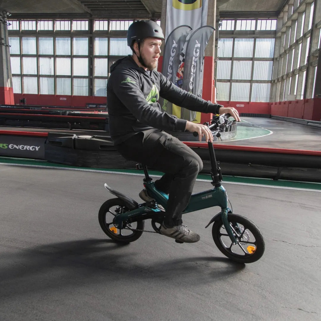 Electric Bike Ms Energy Urbanfold I6, compact design, riding on a track, features a sleek frame, suitable for urban commuting.