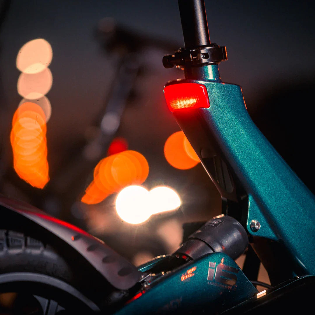Electric Bike Ms Energy Urbanfold I6 features a sleek design with a vibrant teal frame and integrated tail light.