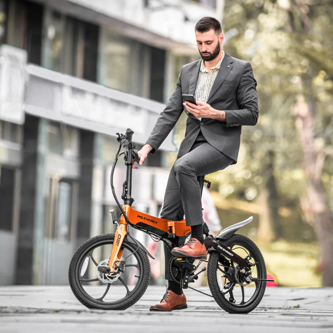 Electric Bike Ms Energy I20 features a sleek design, stylish orange frame, compact size for urban riding.