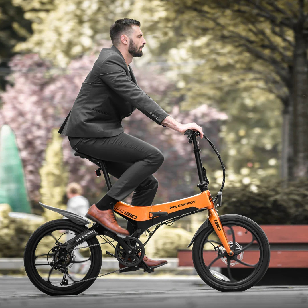 Electric Bike Ms Energy I20 features a sleek orange frame, ideal for urban commuting in style.