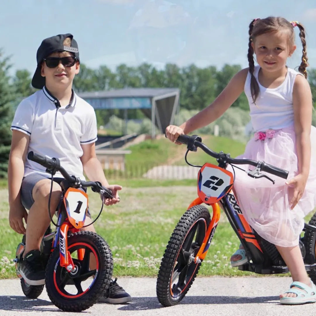 Electric Bike Apollo Sedna 16 Rxf, vibrant kids' electric bike in orange, suitable for outdoor fun.