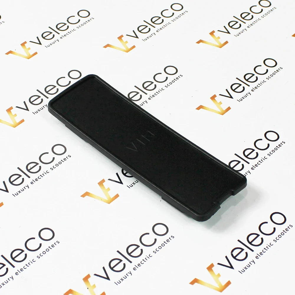 VIN cap for Veleco Cristal – black rectangular cap with text
