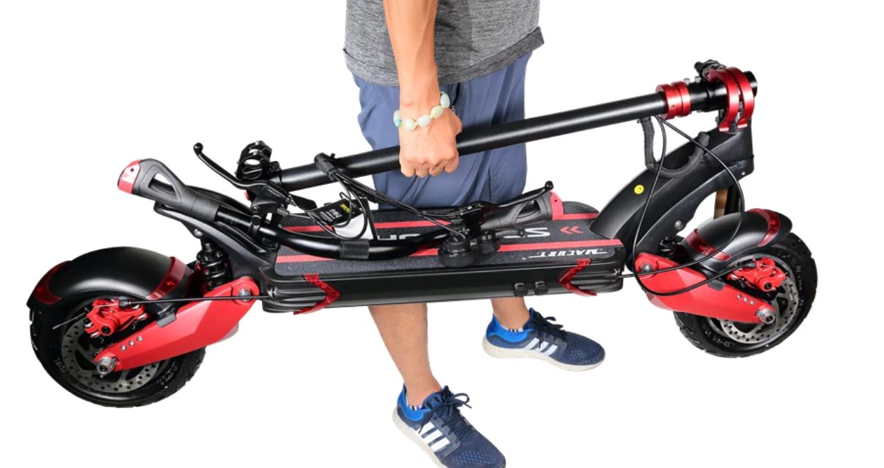 Lifting Handle for ECO Speed 10x Electric Scooter – person carrying folded scooter