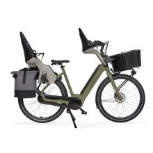 Cortina Common Family electric bike with two child seats and a basket, ideal for family rides
