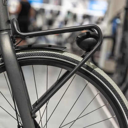 Close up of the rear wheel and frame details of the Cortina Common Family electric bike