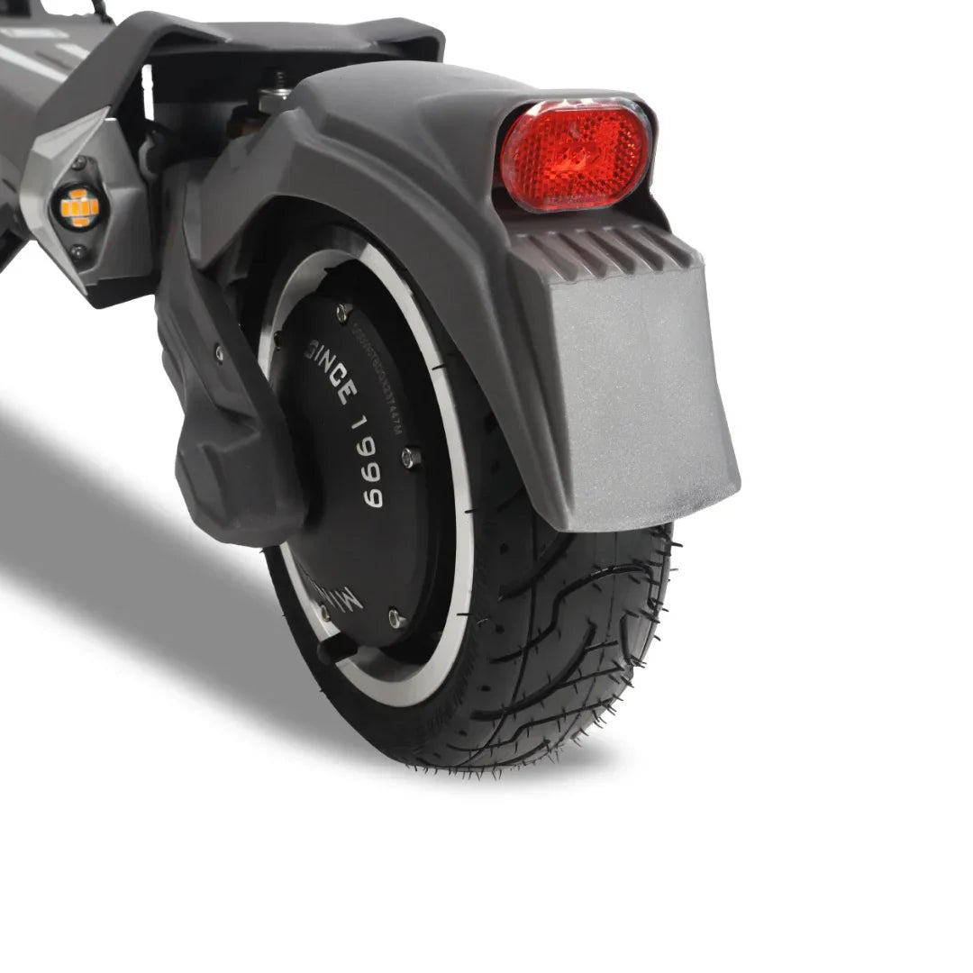A close-up of the rear wheel and fender of the Dualtron Togo electric scooter