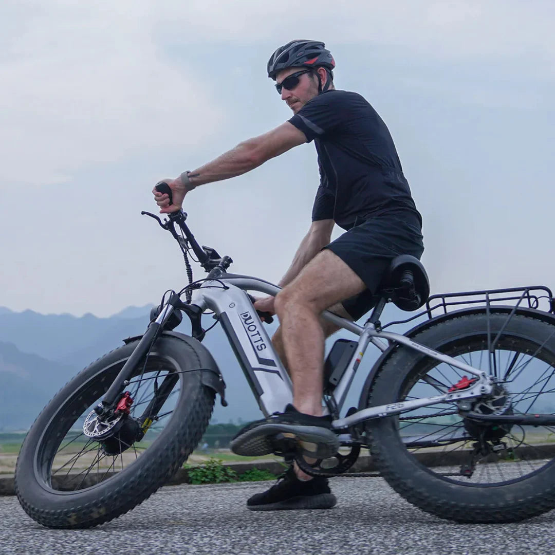 Electric Bike Duotts F26 features a robust frame, oversized tires, and a stylish design for off-road adventures.