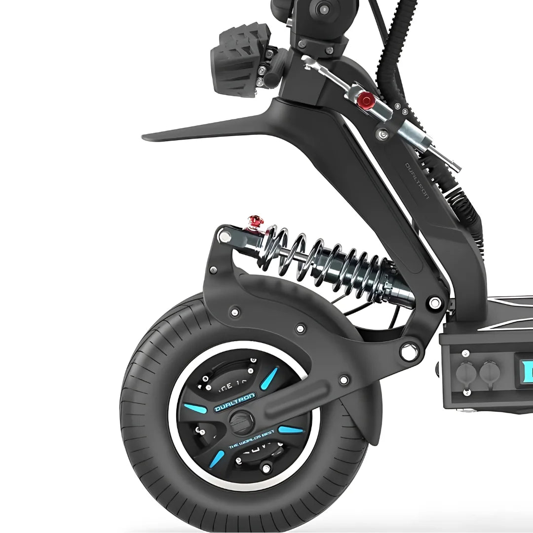 A close-up shot of the Dualtron X Limited electric scooter showing the rear suspension and wheel