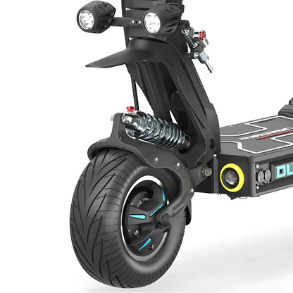 A close-up shot of the Dualtron X Limited electric scooter showing the tire and suspension system