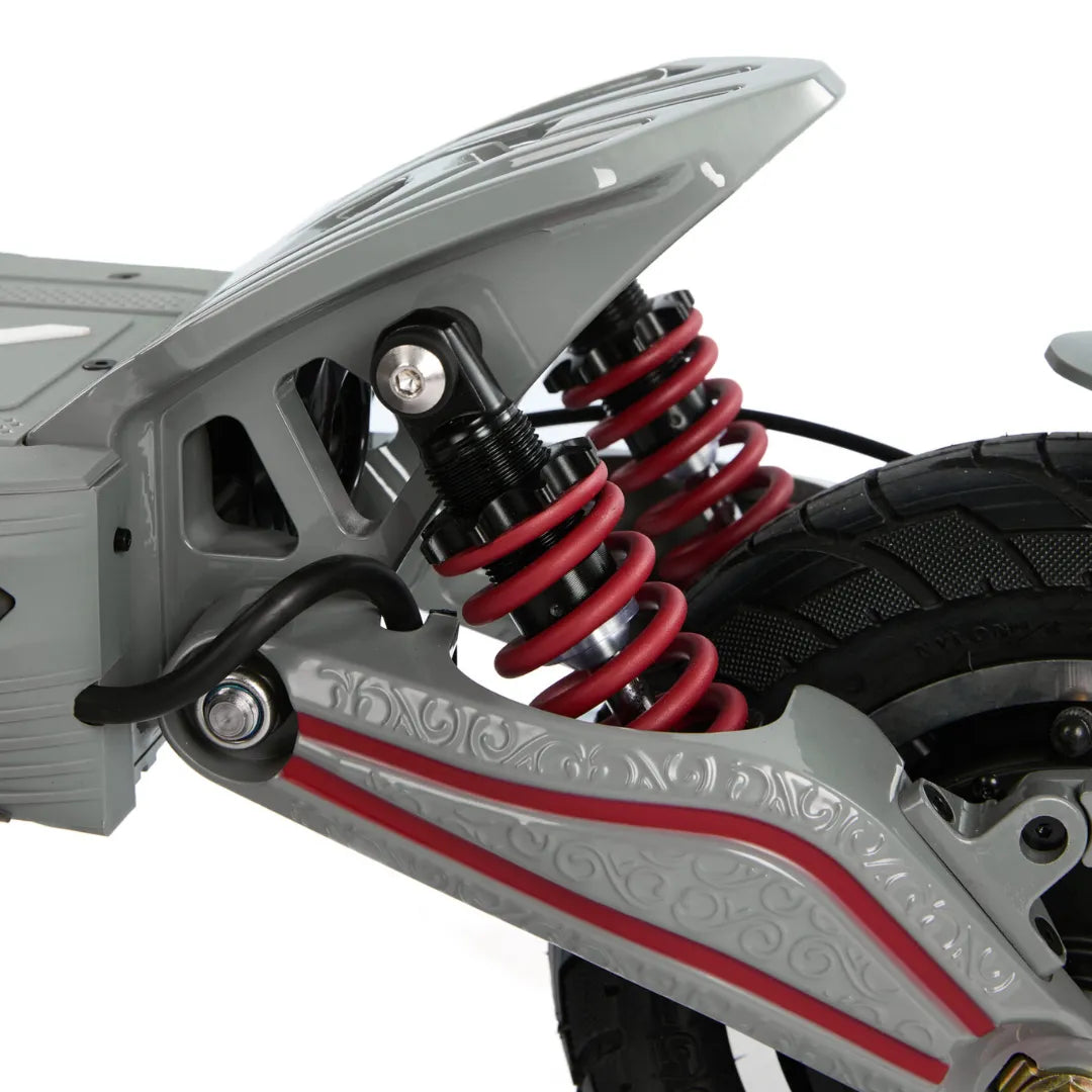 Electric Scooter Eco Speed 10x V2 features robust red shock absorbers and stylish gray frame design.