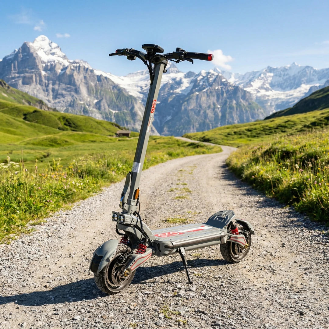 Electric scooter ECO Speed 10X V2 – parked on gravel path, mountains in background