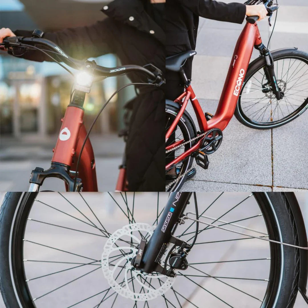 Electric Bike Econo Apes Eer4, sleek red frame, front light, disc brakes, perfect for urban commuting.