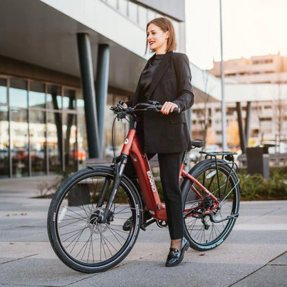 Electric Bike Econo Apes Eer4, stylish red electric bike, woman in black attire, urban setting, modern design.