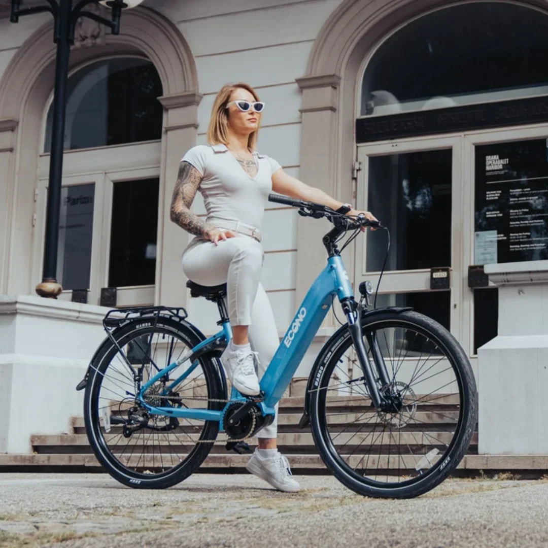 Electric bicycle Econo Mare City EEC4LK – woman posing with bike outdoors