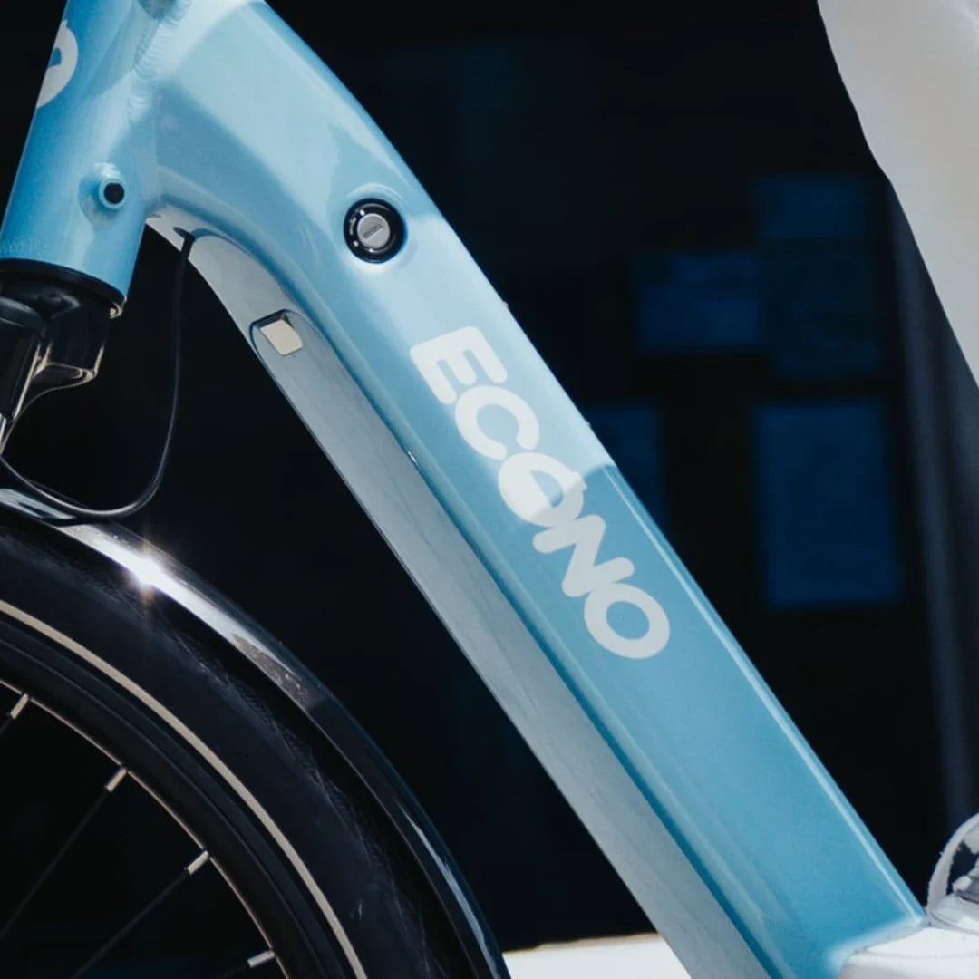 Electric Bike Econo Mare City Eecalk Auto, sleek blue frame, visible battery compartment, modern design.