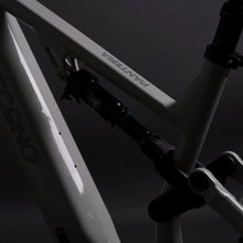 Close-up of the suspension system on the mountain electric bike Econo Pantera SUV C6 120, showcasing its sleek frame design