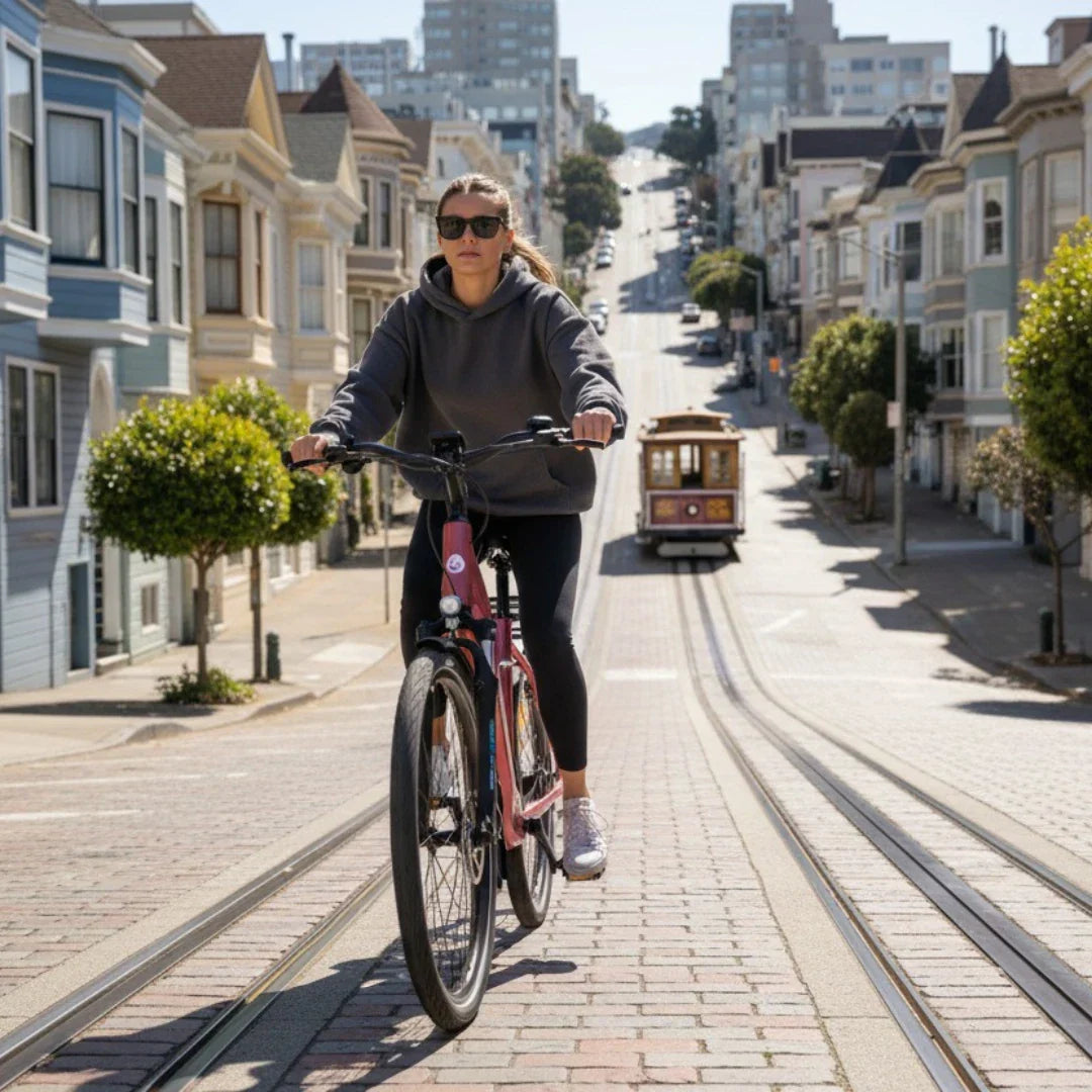 Electric bicycle ECONO Apes CITY EER4 – woman riding red bicycle on steep street