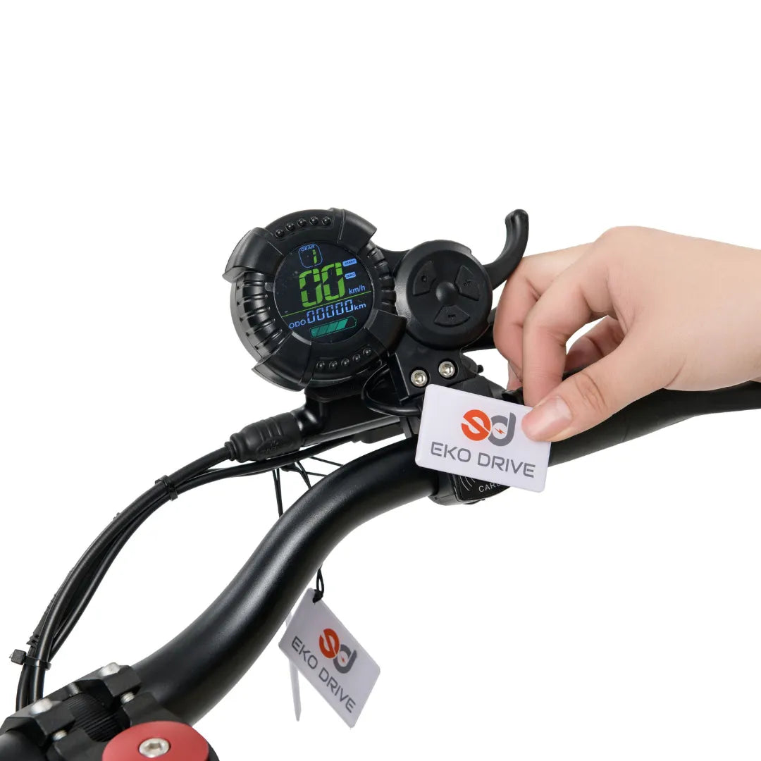 Electric scooter ECO Speed 9X – dashboard and handlebar close-up, hand with card