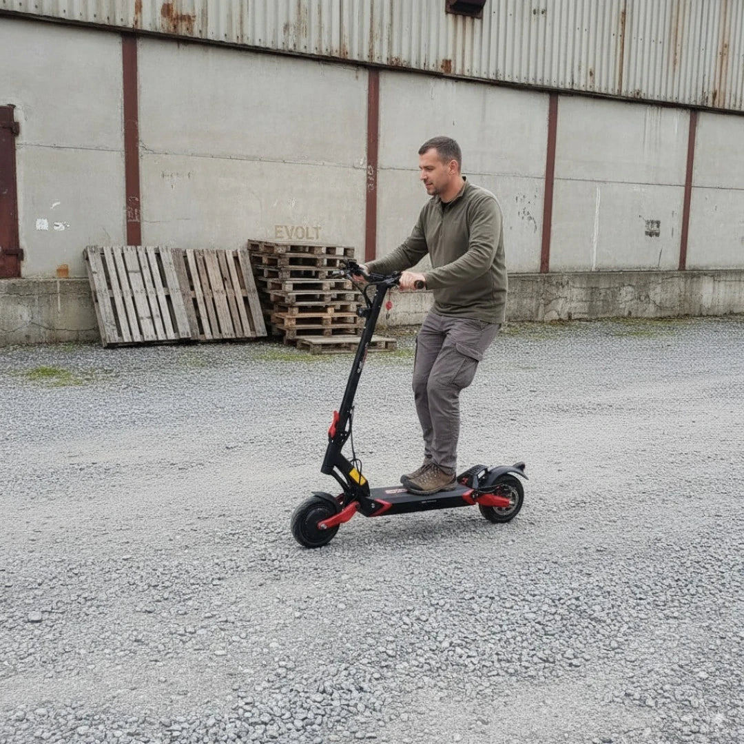 Electric scooter ECO Speed 9X – man riding on gravel path