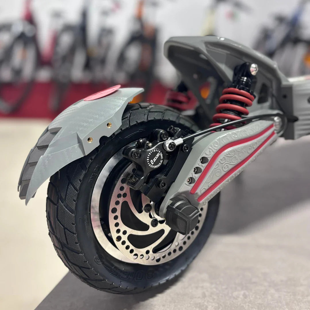 Electric Scooter Eco Speed 10x V2 features a robust rear wheel, sleek design, and advanced suspension system.