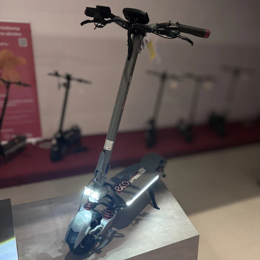 Electric Scooter Eco Speed 10x V2 features a sleek design, LED lights, and advanced suspension for a smooth ride.