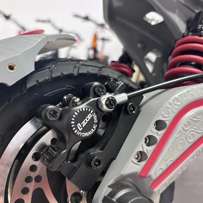 Electric Scooter Eco Speed 10x V2 features a close-up of a hydraulic disc brake system for enhanced stopping power.