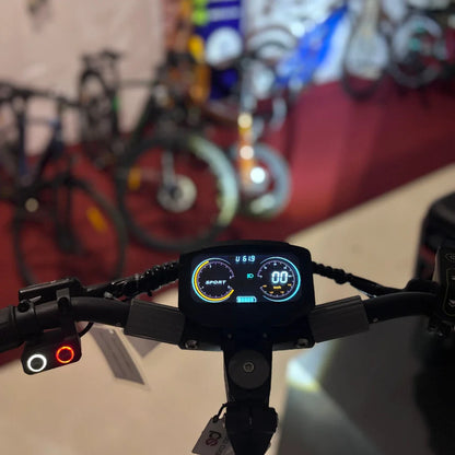 Electric Scooter Eco Speed 10x V2, features a digital display showing speed and mode, sleek handlebars with controls.