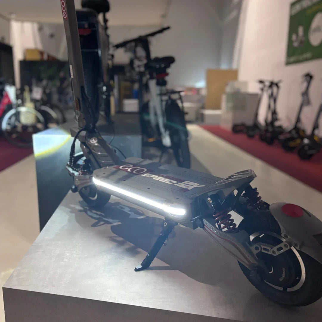 Electric scooter ECO Speed 10X V2 – front three-quarter view with kickstand down