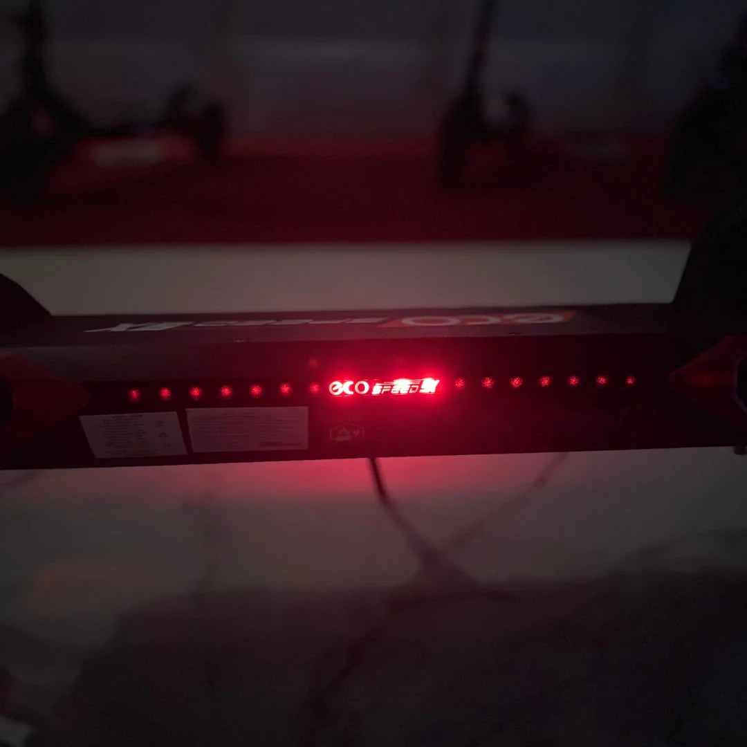 Electric Scooter Eco Speed 9x features a sleek design with illuminated display showing battery status.
