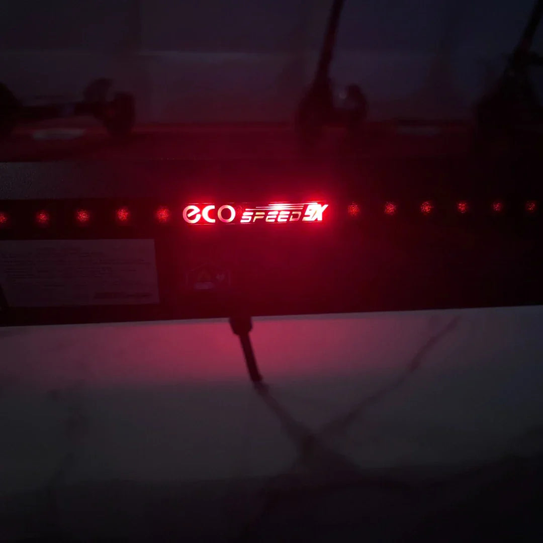 Electric scooter ECO Speed 9X – close-up of illuminated deck logo