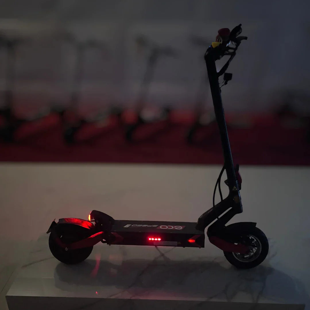 Electric scooter ECO Speed 9 – side view, red lights illuminated