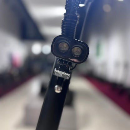 Electric Scooter Eco Speed 9 features a sleek design with a durable frame and dual front lights for safety.