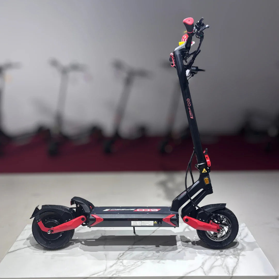 Electric Scooter Eco Speed 9 features a sleek design, red accents, sturdy frame, and front suspension for a smooth ride.