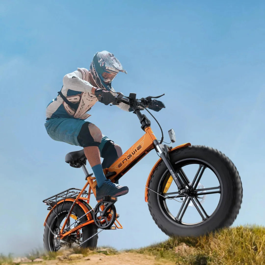 Electric Bike Engwe Ep 2 Pro features a striking orange frame, large tires, and an active rider.