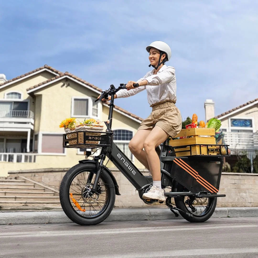 Electric Bike Engwe Le20 features a sleek design, carrying groceries in front and rear baskets, ideal for errands.