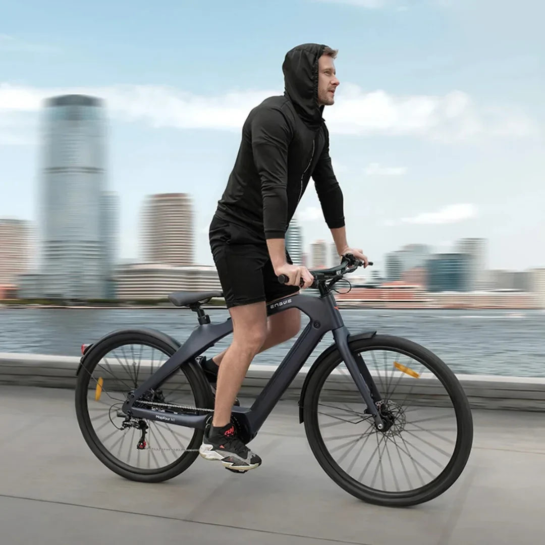 Electric bicycle Engwe MapFour N1 PRO – rider on bike, urban background