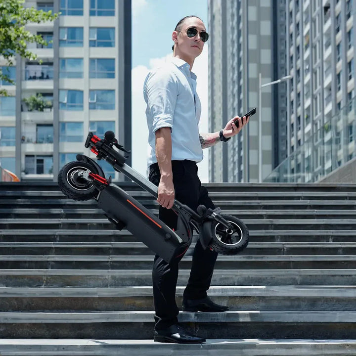 Electric Scooter Engwe Y600s, sleek foldable design, carried by a man in a city setting, stylish and practical.