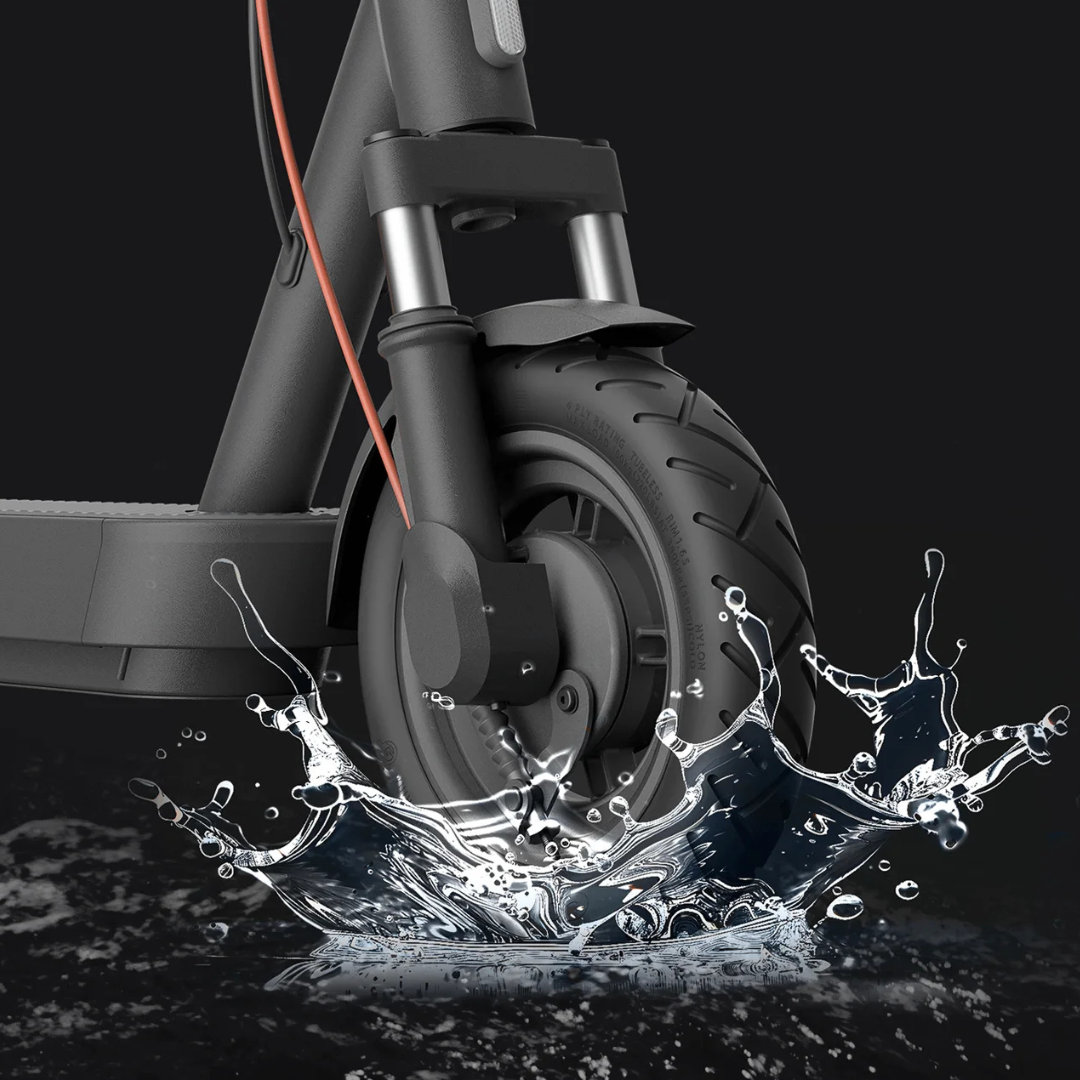 Electric Scooter Xiaomi 5 showcasing its durable wheel splashing water, emphasizing all-terrain capability.